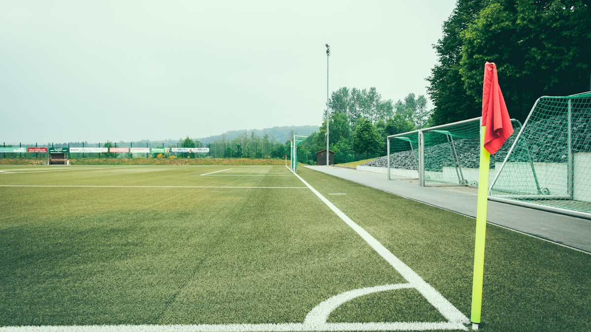 minimalist photo of soccer field