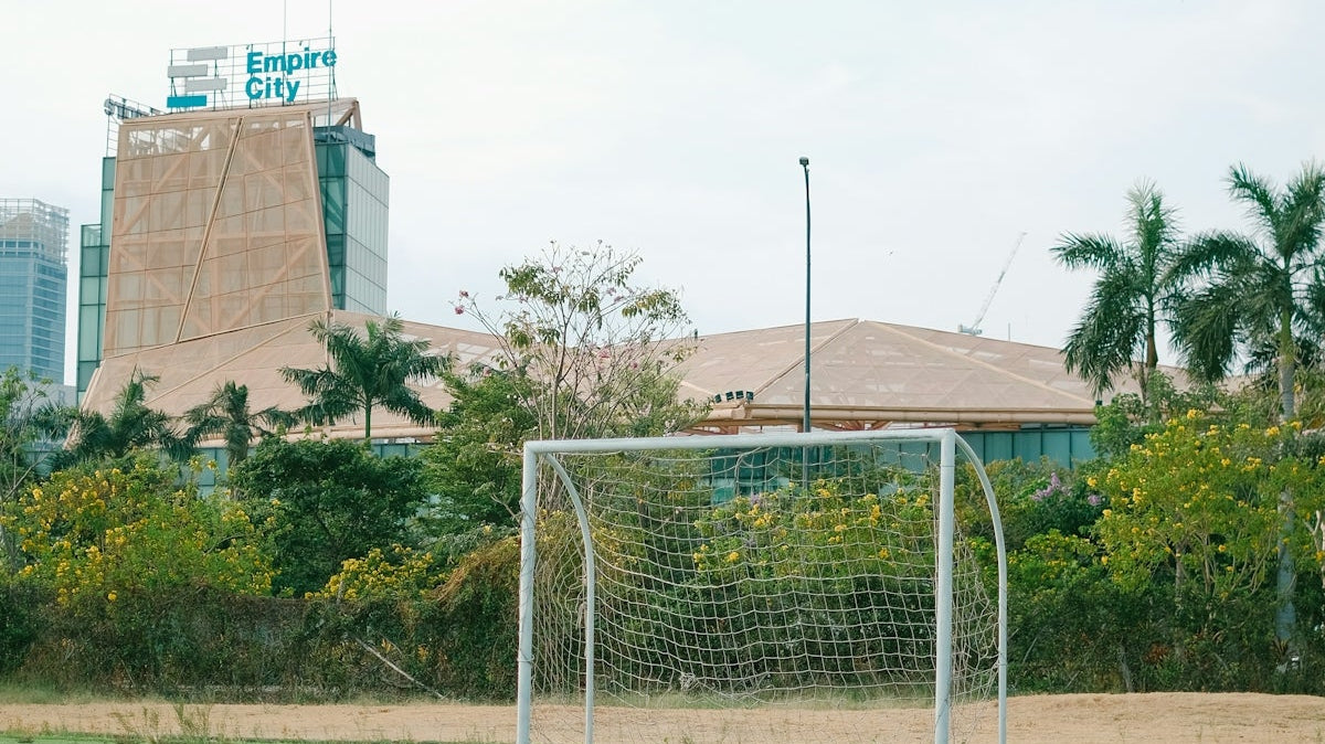 a soccer field with a soccer goal in the middle of it