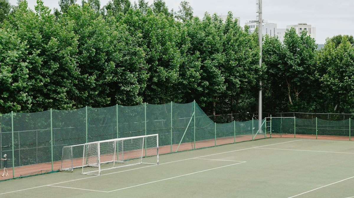 An empty soccer field awaits play.