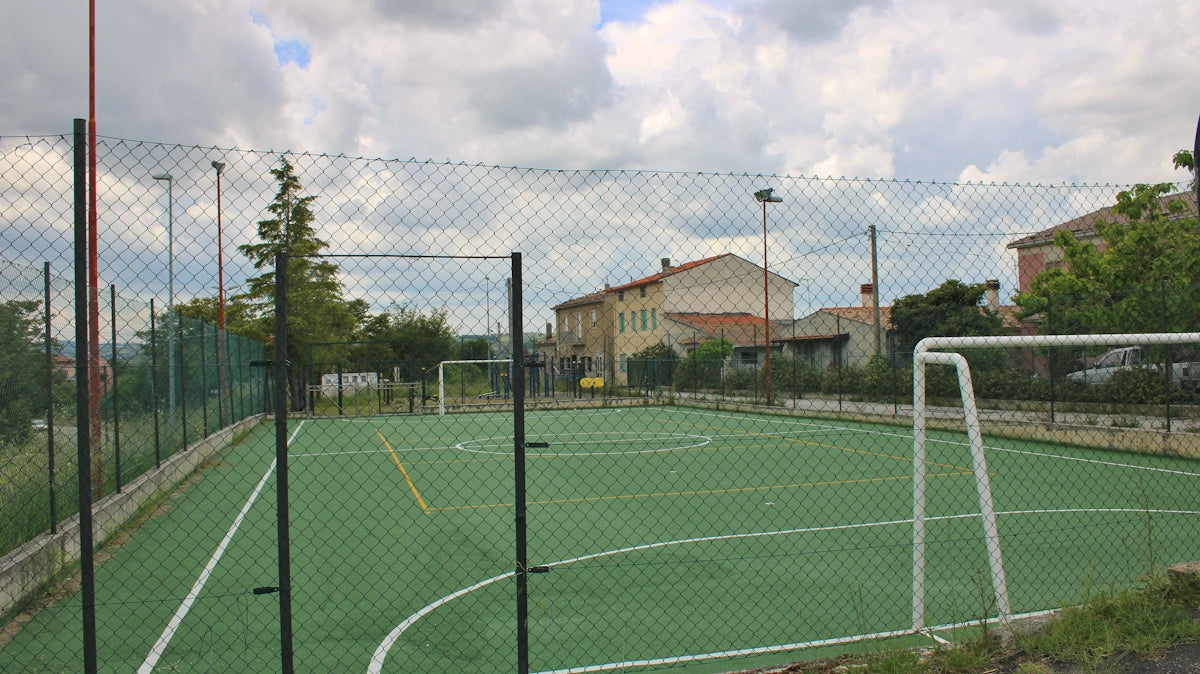 Outdoor soccer field with goals and markings