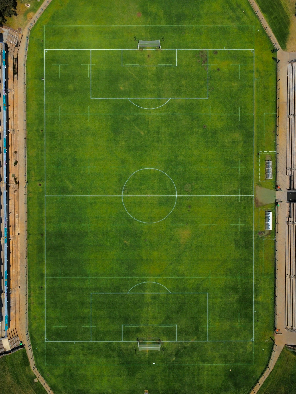 an aerial view of a soccer field in a city