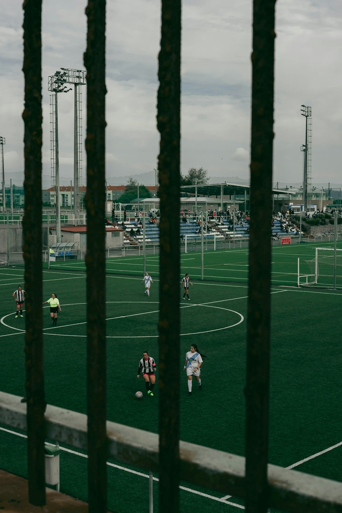 a group of people playing a game of soccer